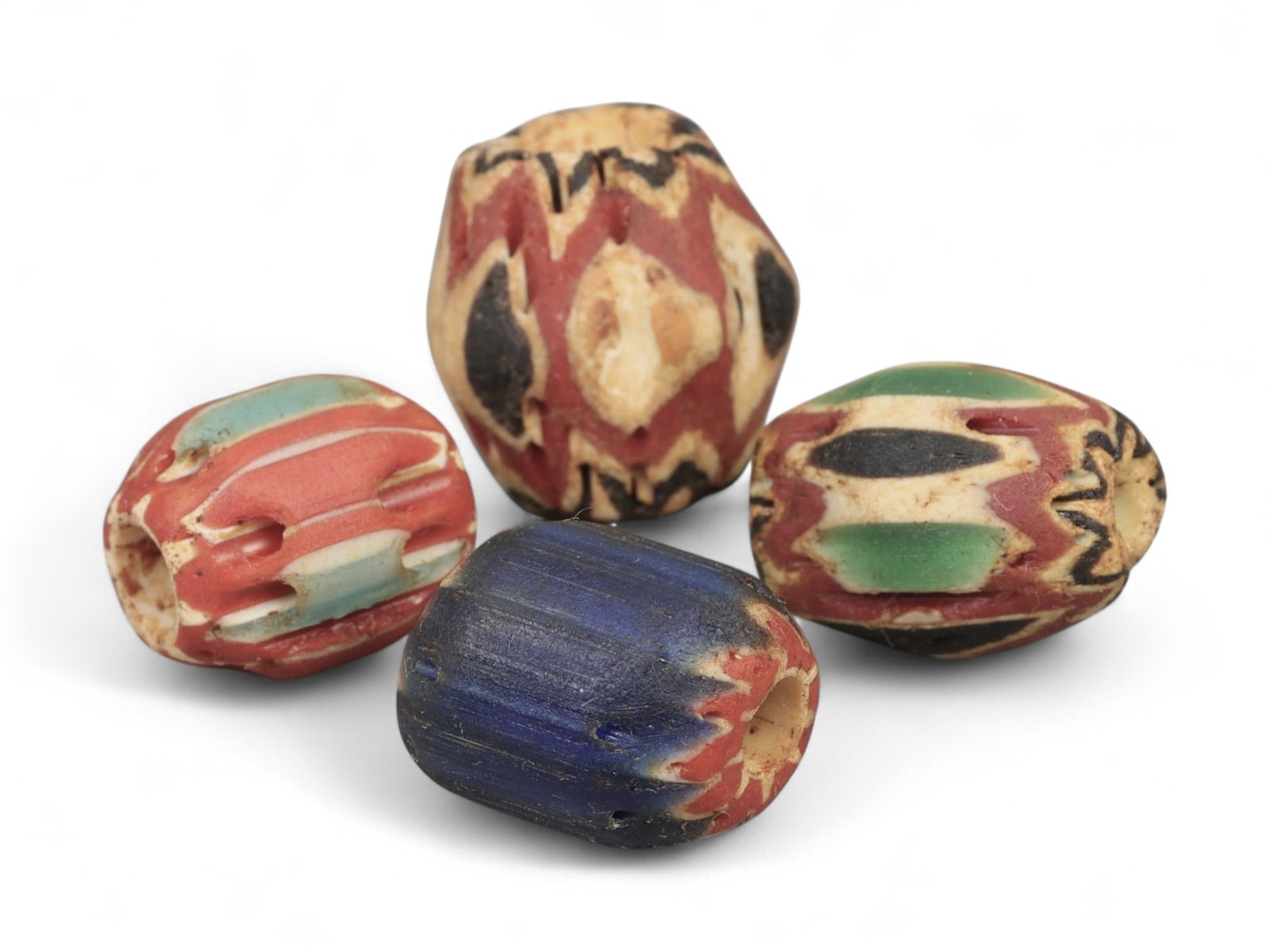 Antique Venetian Chevron Trade Glass Beads, c. 18th-19th Century, 1.3-1.5cm: These striking antique glass beads originate from Venice, renowned during the 18th and 19th centuries for its unparalleled glassmaking traditions centered in Murano. Known as chevron beads, they were 
