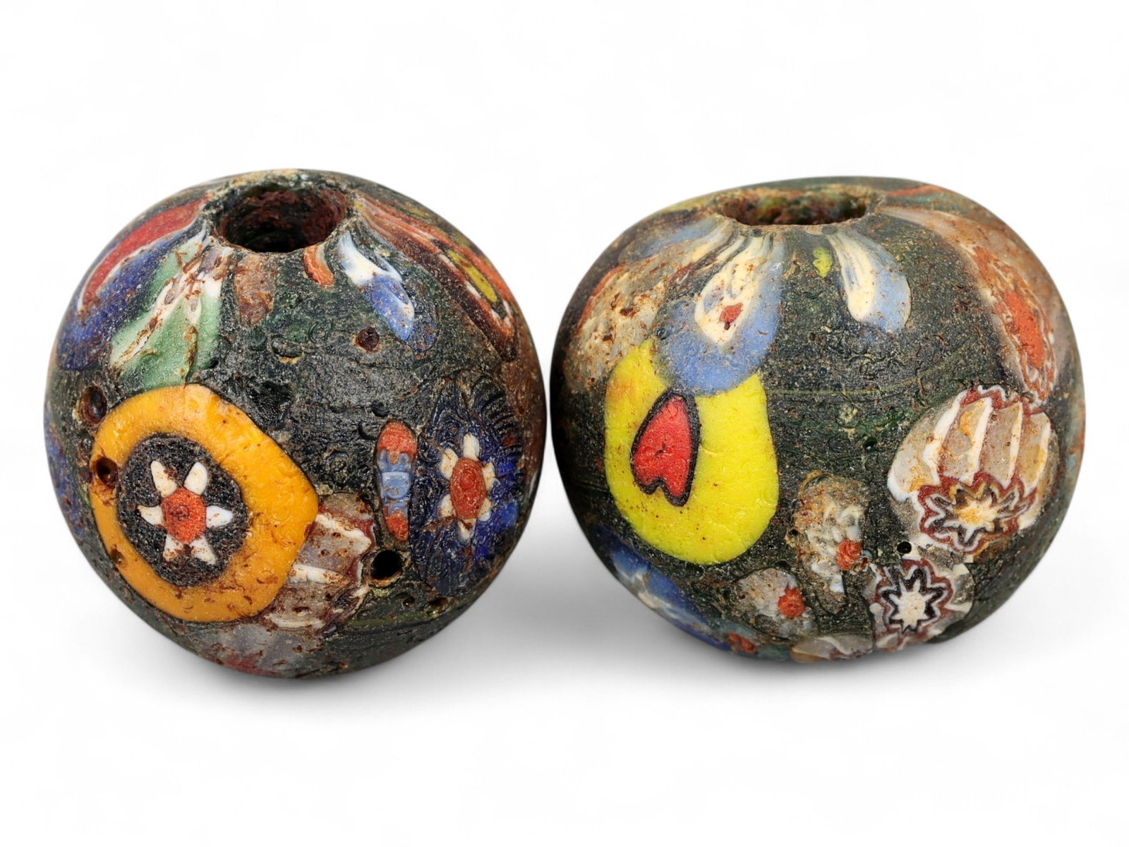 Antique Venetian Scrabble Glass "End of the Day" Bead Pair, Mid-20th Century, 2.2cm: This vibrant pair of Venetian scrabble glass beads, each measuring 2.2 cm, dates to the mid-20th century and reflects the lively artistry of Murano's "end of the day" bead tradition. Known also as "sc