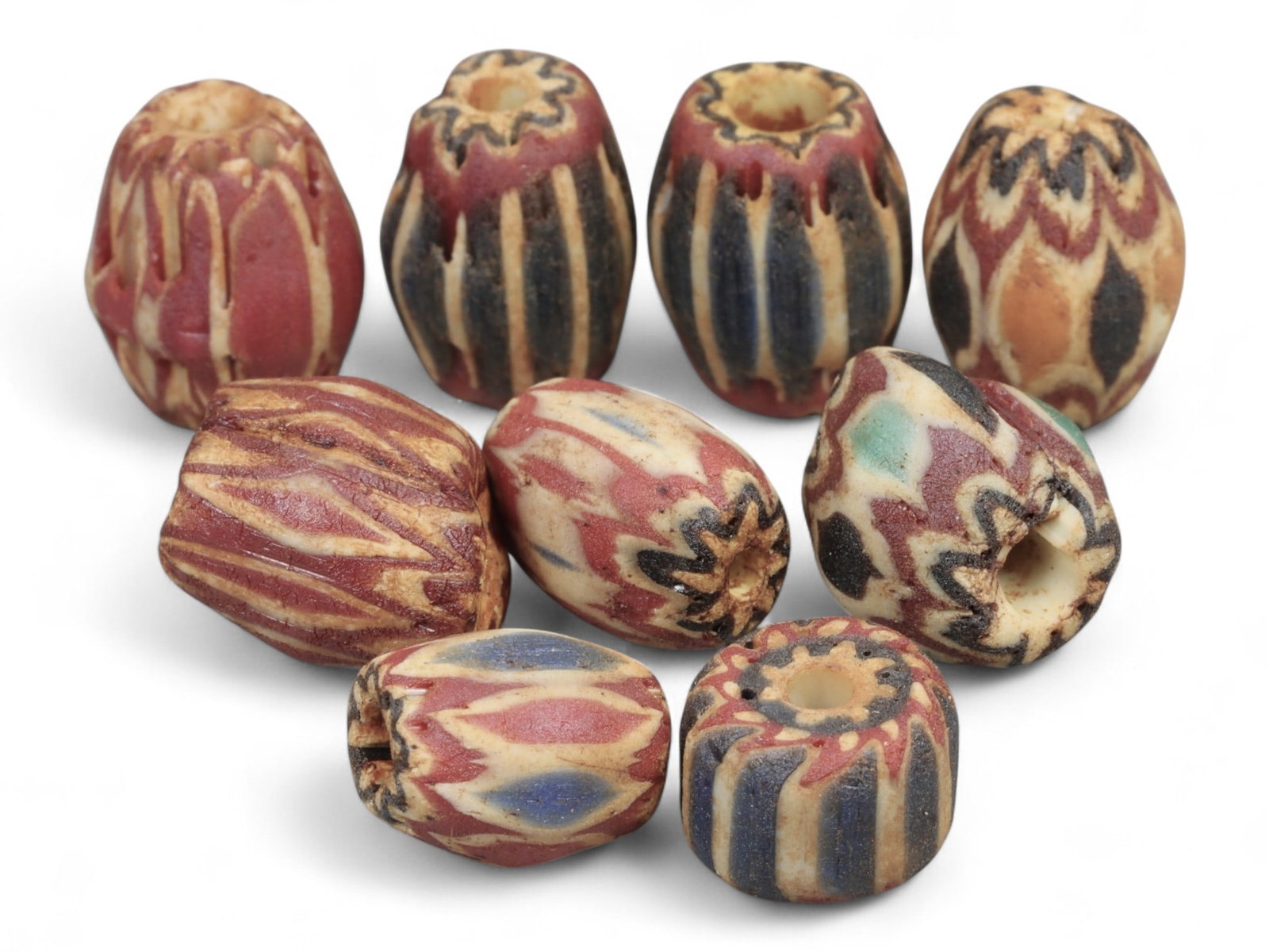 Antique Venetian Chevron Trade Glass Beads, c. 18th-19th Century, 0.7-1.3cm: This fine lot of Venetian chevron beads represents the height of Murano glass artistry during the 18th and 19th centuries. Known for their layered starburst patterns, chevron beads were among the most