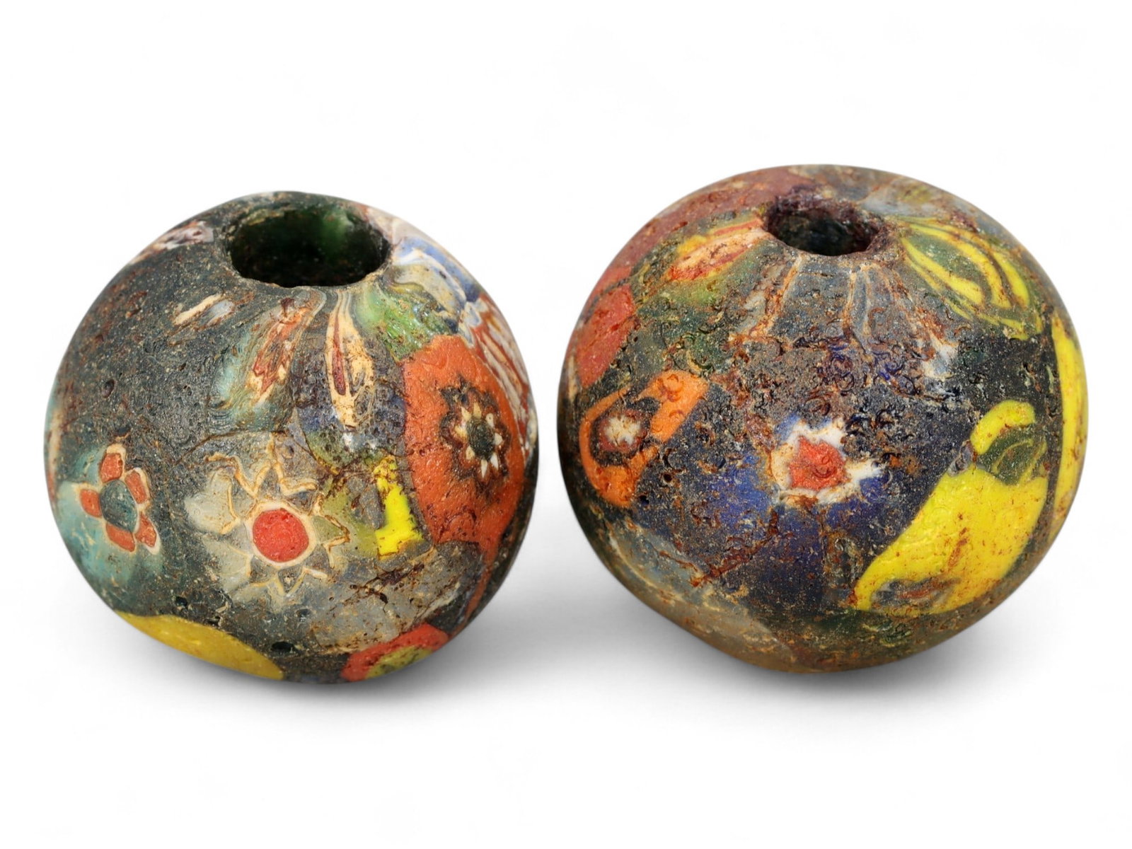 Antique Venetian Scrabble Glass "End of the Day" Bead Pair, Mid-20th Century, 2.2cm: This vibrant pair of Venetian scrabble glass beads, each measuring 2.2 cm, dates to the mid-20th century and reflects the lively artistry of Murano's "end of the day" bead tradition. Known also as "sc