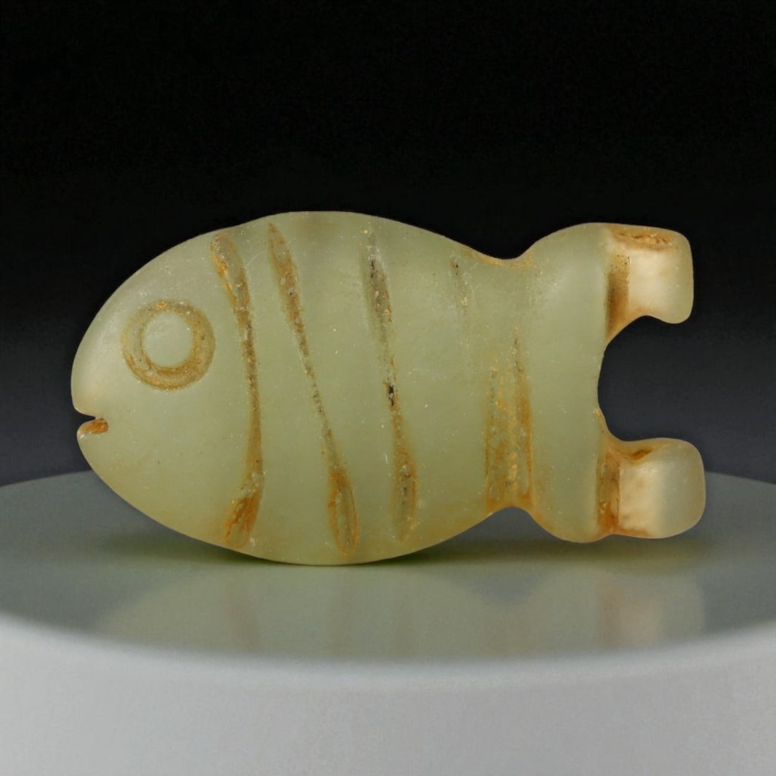 Ancient Egyptian Late Period Green Faience Fish Amulet, c. 664-332 BCE, 2.1cm (1 of 2)