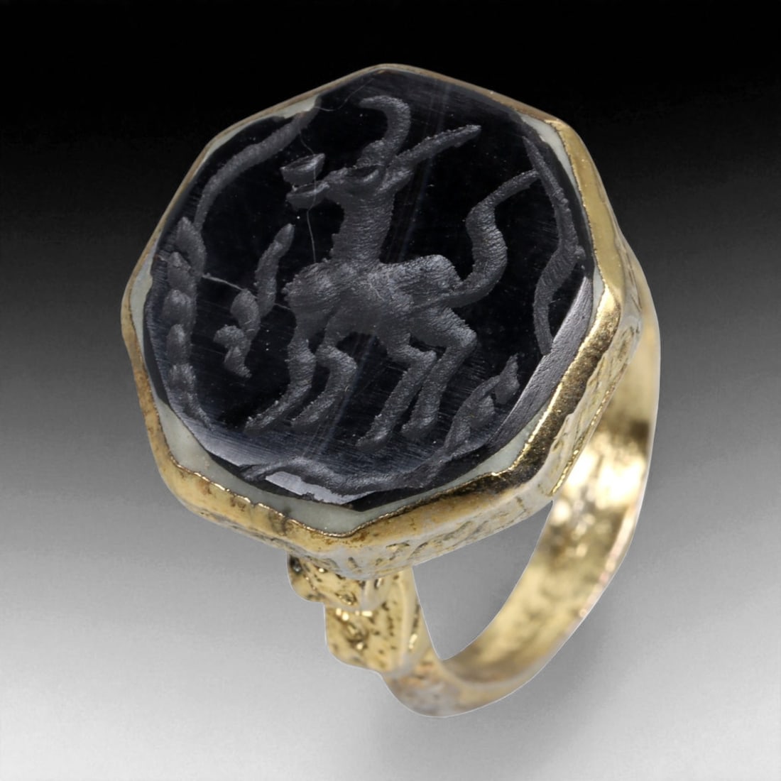 Antique Qajar Gold Gilt Intaglio Signet Ring, c. 19th-20th Century, 8.5 US, 16g: This substantial gilt ring, dating to the Qajar era of the 19th-20th century, embodies the regal aesthetic and cultural refinement of Persian jewelry traditions. The bezel is set with an engraved inta