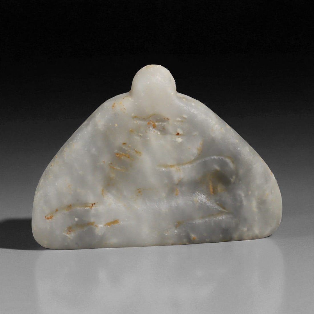 Ancient Mesopotamian Gazelle Motif Chalcedony Amulet Pendant, c. 2nd-1st Millennium BCE 19g: This graceful chalcedony amulet pendant, measuring 4.5 cm and weighing 19 grams, originates from Mesopotamia, dating between the Late Bronze Age and Early Iron Age (c. 2nd-1st millennium BCE). The eng
