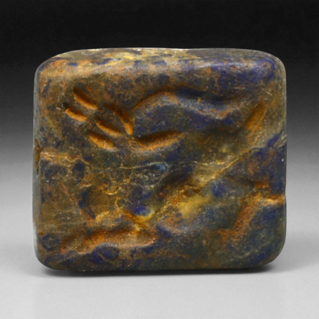 Ancient Elamite-Indus Gazelle Motif Lapis Lazuli Square Stamp Seal, c. 2500-1800 BCE, 3g: This rare square lapis lazuli stamp seal originates from the culturally rich Elamite-Indus interaction zone, flourishing between 2500 and 1800 BCE. Skillfully carved into its petite form is a leaping 