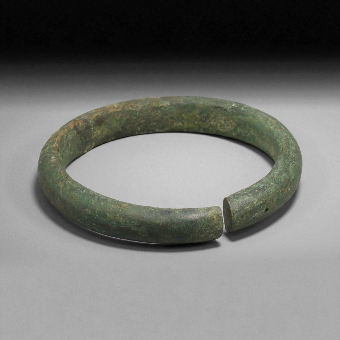 Ancient Roman Bronze Bracelet, c. 1st-3rd Century CE, 8cm, 133g: This ancient Roman bronze bracelet dates to the height of the Roman Empire, between the 1st and 3rd centuries CE, a time of expansive trade, engineering marvels, and refined metal craftsmanship. Bronz