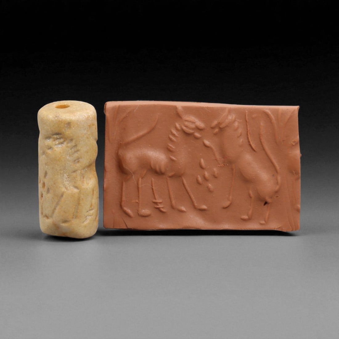 Ancient Mesopotamian Administrative Cylinder Seal, c. 2nd-1st Millennium BCE, 16g: This authentic cylinder seal from ancient Mesopotamia dates to the 2nd to 1st millennium BCE, a time when the art of carving miniature narratives on stone reached remarkable levels of refinement. Seal