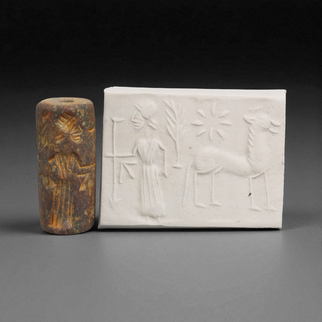 Ancient Mesopotamian Administrative Cylinder Seal, c. 2nd-1st Millennium BCE, 21g: This authentic cylinder seal from ancient Mesopotamia dates to the 2nd to 1st millennium BCE, a time when the art of carving miniature narratives on stone reached remarkable levels of refinement. Seal