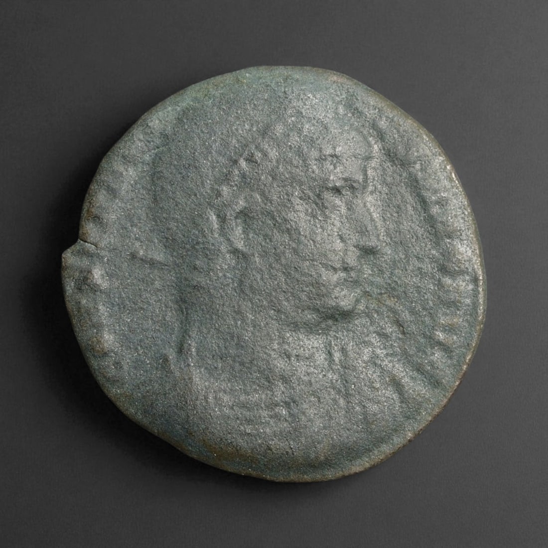 ROMAN EMPIRE: Imperial Authority - Bronze Coin, c. 1st-3rd Century AD, 17mm: Struck during the turbulent decades of the later Roman Empire, this 19mm bronze coin reflects the enduring symbolism of imperial control amidst crisis. Its compact yet deliberate design likely feature