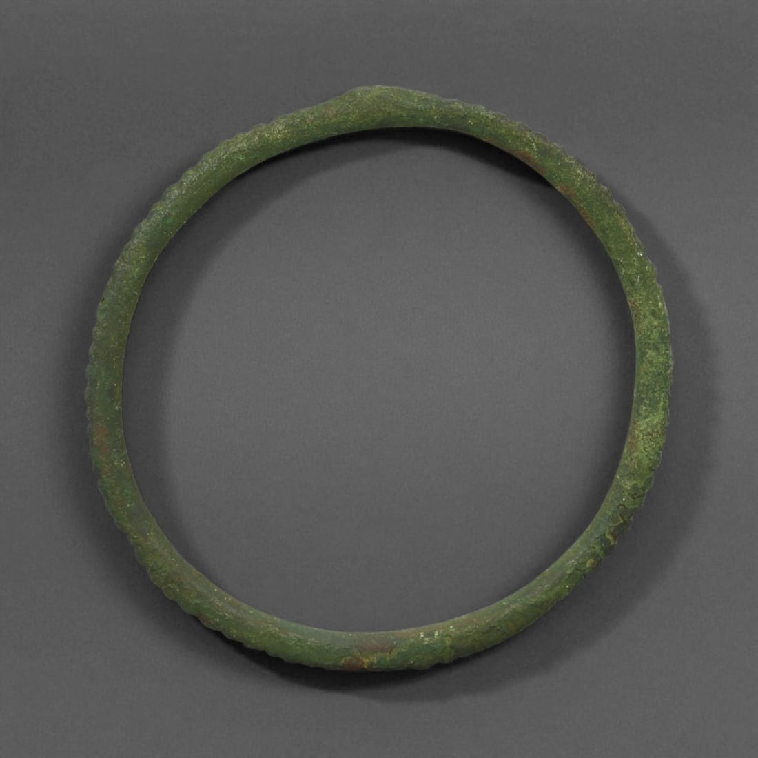 Ancient Roman Armillae Symbolic Bronze Bangle, c. 1st-3rd Century CE, 7cm, 25g: This authentic bronze bangle dates to the height of the Roman Empire, circa 1st-3rd century CE, a period marked by expansion, engineering marvels, and the spread of Roman culture across Europe and the