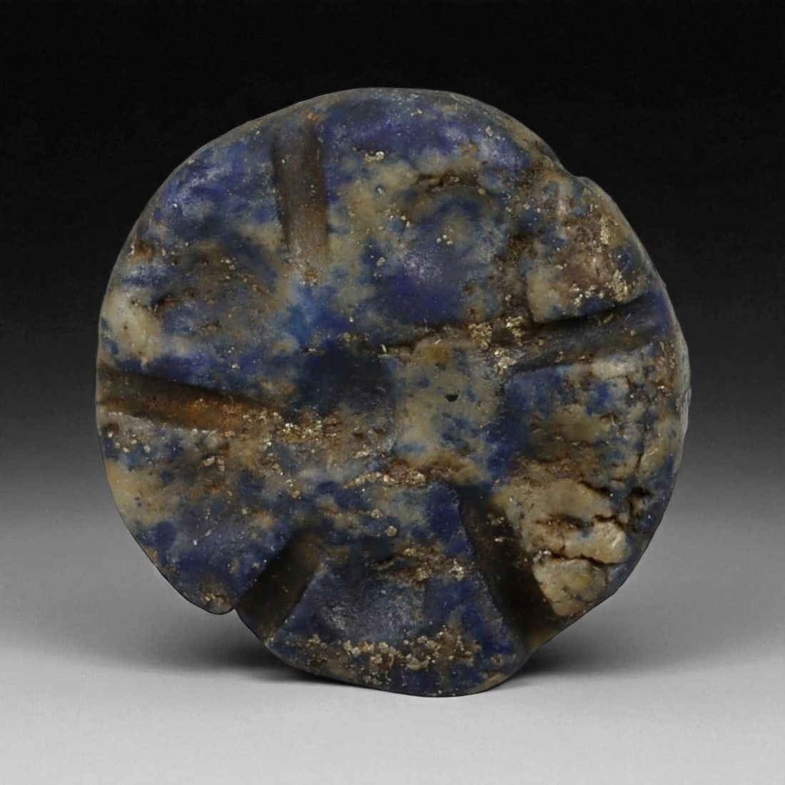 Ancient Phoenician Star-Cut Lapis Lazuli Trade Bead, c. 7th-5th Century BCE, 1.6cm, 2.5g: This mesmerizing ancient bead, carved from deep blue lapis lazuli, hails from the Phoenician world of the 7th-5th century BCE-a time when maritime trade routes flourished across the Mediterranean. Thi