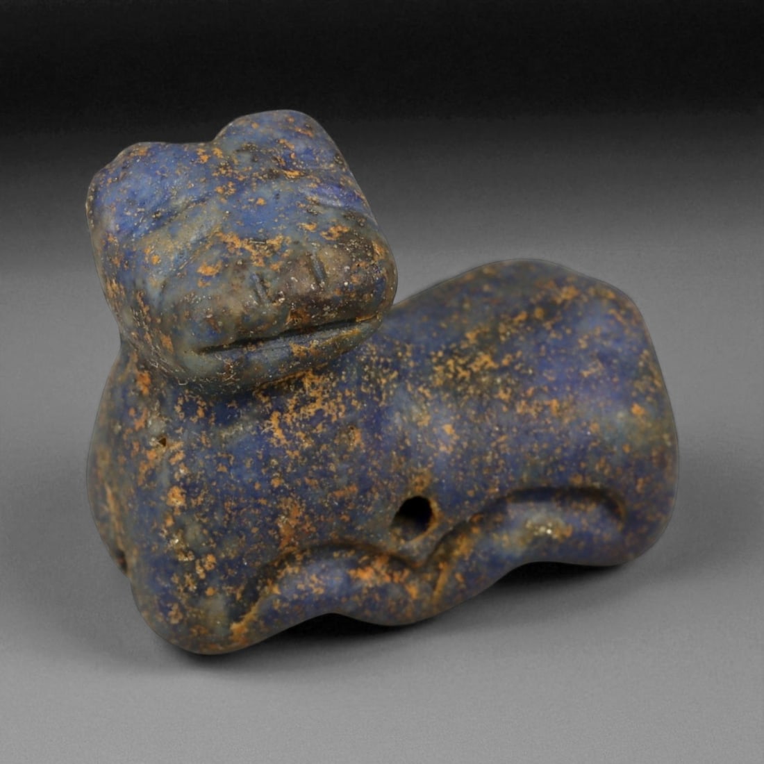 Ancient Bactrian Lapis Lazuli Feline Amulet, c. 3rd-2nd Millennium BCE, 1.5cm, 4g: This finely carved feline amulet, crafted from deep blue lapis lazuli. It originates from Bactria (ancient Afghanistan, c. 2300-1700 BCE), a region celebrated for its lapidary artistry and as the worl