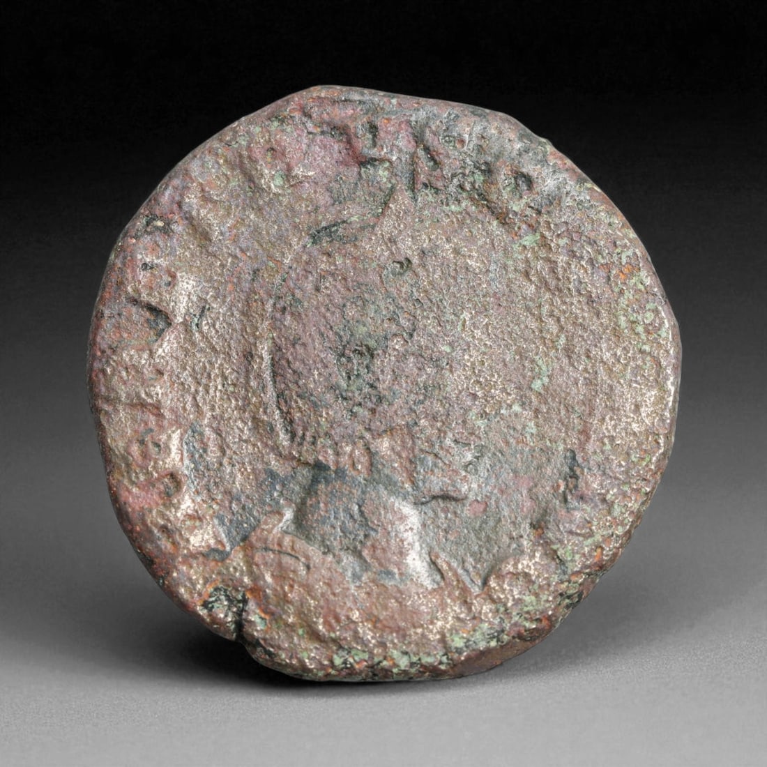 ROMAN EMPIRE: Imperial Authority - Bronze Coin, c. 1st-3rd Century AD, 27mm: Struck during the turbulent decades of the later Roman Empire, this 19mm bronze coin reflects the enduring symbolism of imperial control amidst crisis. Its compact yet deliberate design likely feature