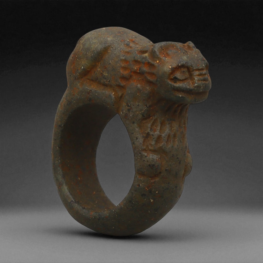 Ancient Parthian Lion-Form Steatite Ring, c. 2nd-1st Century BCE, 3.8 cm: This striking ring, carved from dense steatite and shaped into the form of a prowling lion, dates to the Parthian Empire-an era that bridged Hellenistic refinement and Persian grandeur. The Parthians,