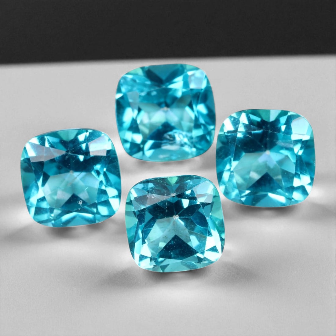 7.42 Carats Paraiba Blue Topaz Lot - Natural Brazilian Stones 7x4 mm: This luminous lot of natural blue topaz gems displays a captivating Paraiba-like glow, radiating intense turquoise and neon-aqua hues. Each stone has been precisely faceted to enhance brilliance, with