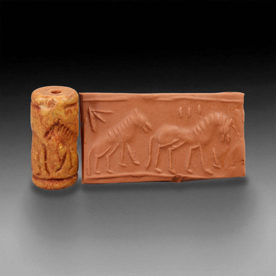 Ancient Early Dynastic Processional Equids Motif Steatite Cylinder Seal, c. 2900-2350 BCE, 3.7 cm: This finely carved steatite cylinder seal, dating to the Early Dynastic Period of Mesopotamia (circa 2900-2350 BCE), presents a graceful procession of equids - likely onagers or asses - rendered in rh