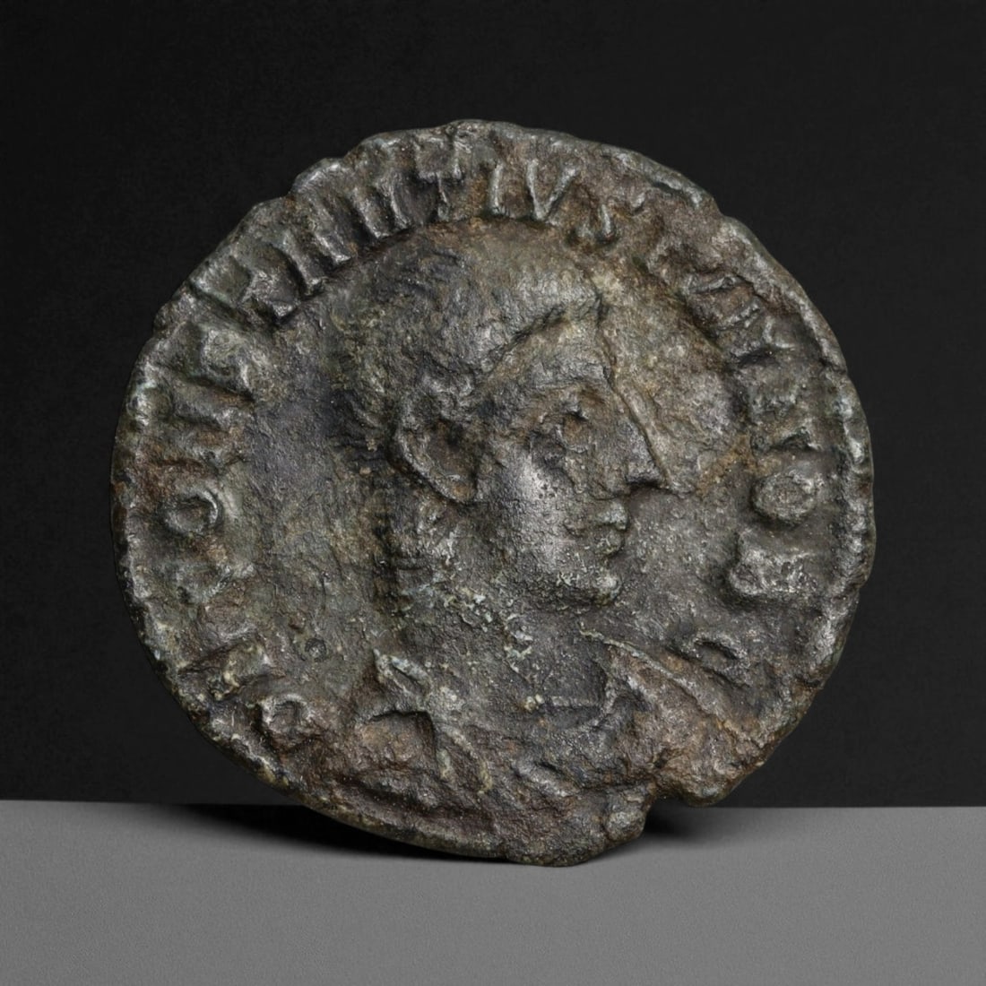ROMAN EMPIRE: Imperial Authority - Bronze Coin, c. 1st-3rd Century AD, 18mm: Struck during the turbulent decades of the later Roman Empire, this 19mm bronze coin reflects the enduring symbolism of imperial control amidst crisis. Its compact yet deliberate design likely feature