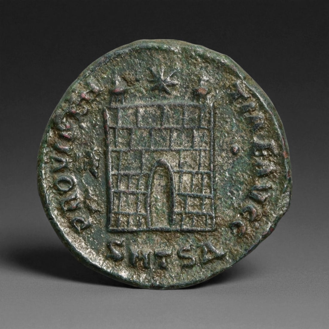 ROMAN EMPIRE: Imperial Authority - Bronze Coin, c. 1st-3rd Century AD, 18mm: Struck during the turbulent decades of the later Roman Empire, this 19mm bronze coin reflects the enduring symbolism of imperial control amidst crisis. Its compact yet deliberate design likely feature