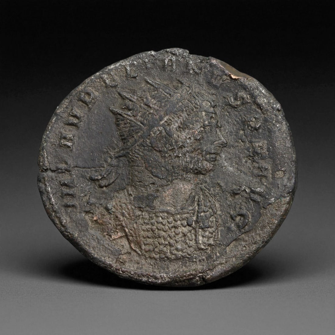 ROMAN EMPIRE: Imperial Authority - Bronze Coin, c. 1st-3rd Century AD, 24mm: Struck during the turbulent decades of the later Roman Empire, this 19mm bronze coin reflects the enduring symbolism of imperial control amidst crisis. Its compact yet deliberate design likely feature
