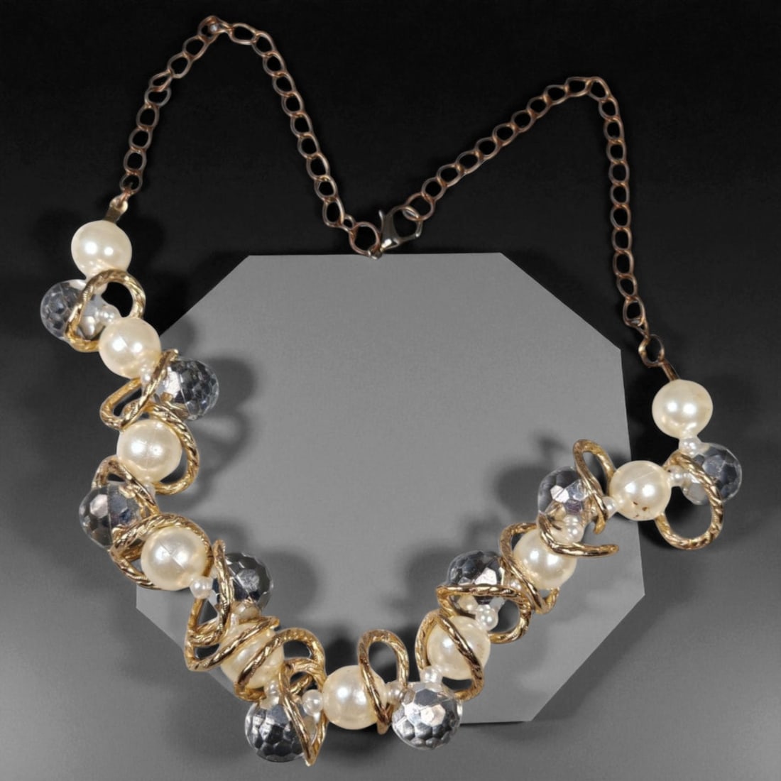 Vintage Fashion Necklace 25cm, Mid-Late 20th Century: A stylish vintage fashion necklace exemplifying the bold and expressive design language of mid-20th century costume jewelry. Crafted from mixed materials such as glass, brass, and plated metal alloys,