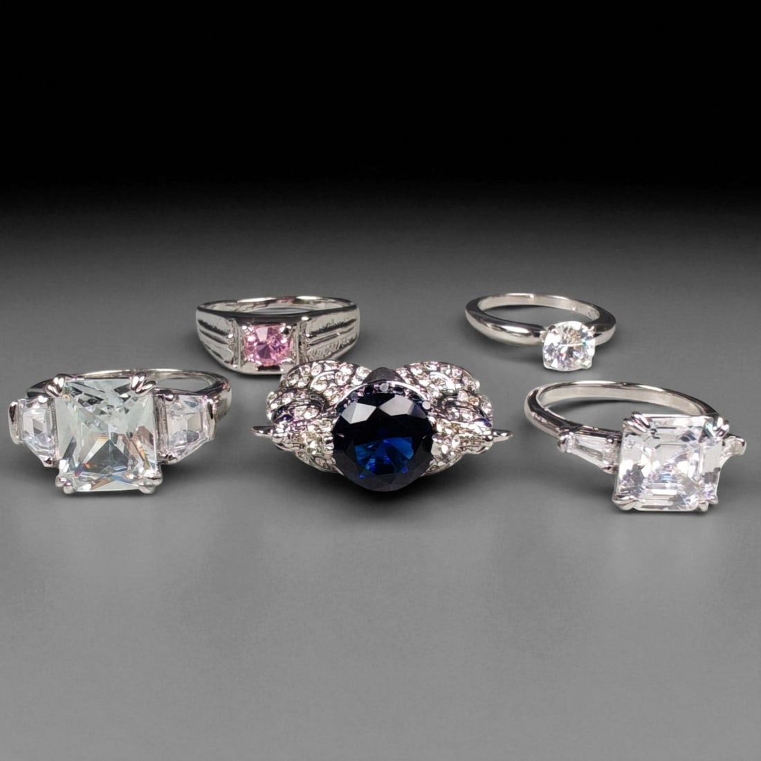 Lot of 5 Vintage and Contemporary Fashion Ring Lot, c. 20th-21st Century: This assorted lot of vintage and contemporary fashion rings offers a vibrant collection of statement pieces showcasing diverse styles, materials, and craftsmanship. Designed for decorative wear rather