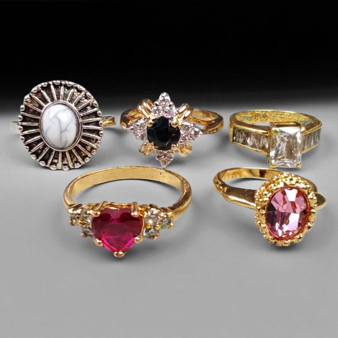 Lot of 5 Vintage and Contemporary Fashion Ring Lot, c. 20th-21st Century: This assorted lot of vintage and contemporary fashion rings offers a vibrant collection of statement pieces showcasing diverse styles, materials, and craftsmanship. Designed for decorative wear rather