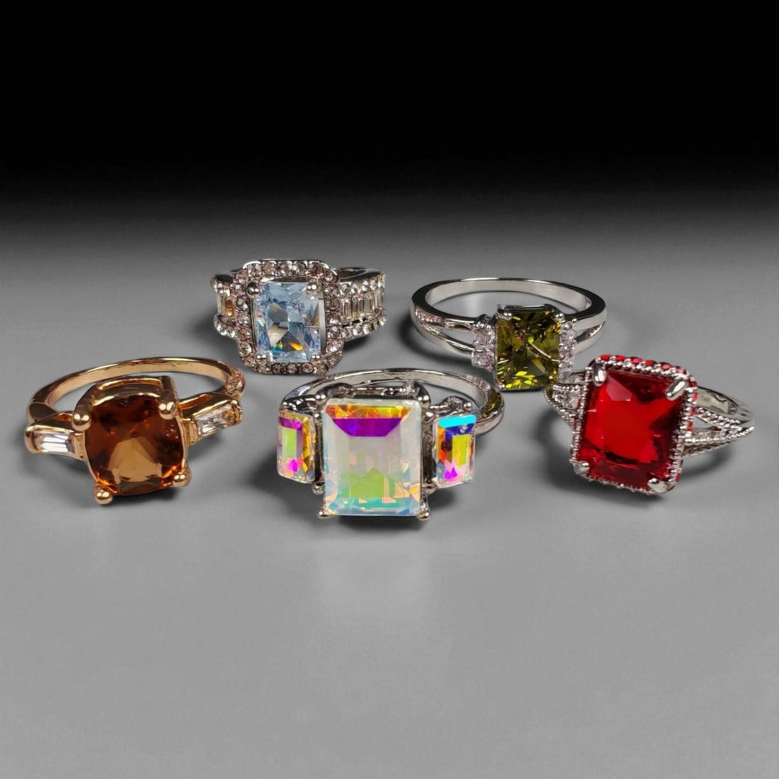 Lot of 5 Vintage and Contemporary Fashion Ring Lot, c. 20th-21st Century: This assorted lot of vintage and contemporary fashion rings offers a vibrant collection of statement pieces showcasing diverse styles, materials, and craftsmanship. Designed for decorative wear rather