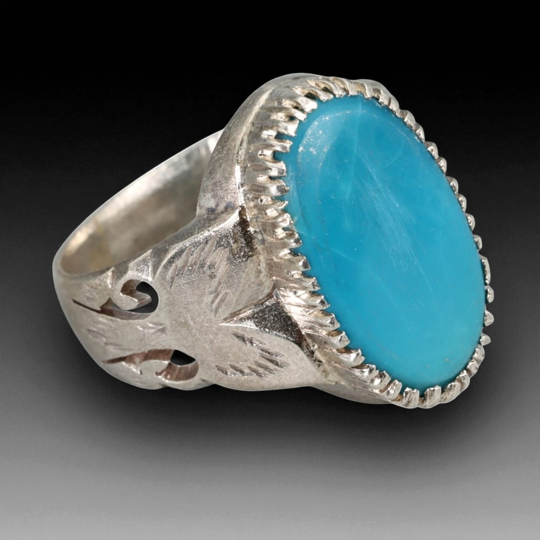 Antique Persian Turquoise Oval Cabochon Silver Ring, c. 19th-20th Century, US Size 10: This elegant antique silver ring embodies the timeless artistry of Persian craftsmanship from the late 19th to early 20th century. Its centerpiece, a polished oval turquoise cabochon of striking sky-b