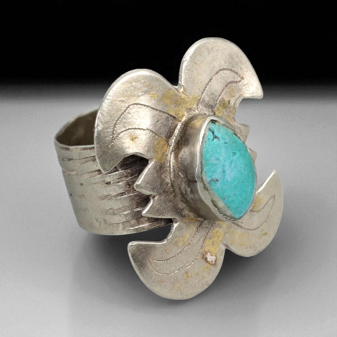 Antique Central Asian Turquoise Cross-Form Silver Ring, c. 19th-20th Century, US Size 9: This striking antique silver ring embodies the bold artistry of Central Asian tribal jewelry, most likely crafted in the regions of Afghanistan or northern Persia during the late 19th to early 20th ce