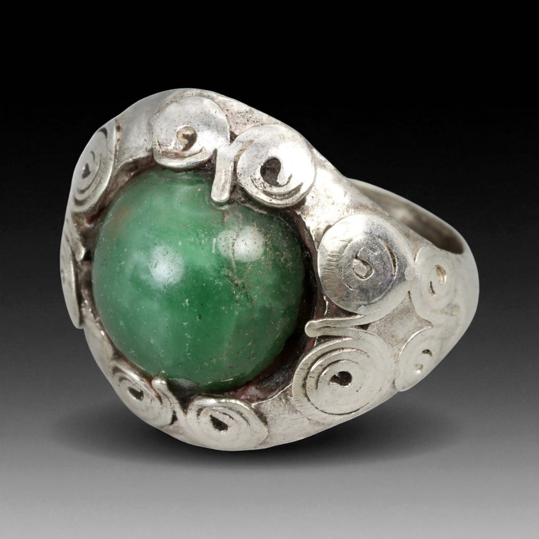 Antique Central Asian Green Chrysoprase Silver Ring, c. 19th-20th Century, US 9: This refined antique ring reflects the distinctive craftsmanship of Central Asian silversmiths from the late 19th to early 20th century. The piece centers a smooth, domed chrysoprase cabochon-a gemsto
