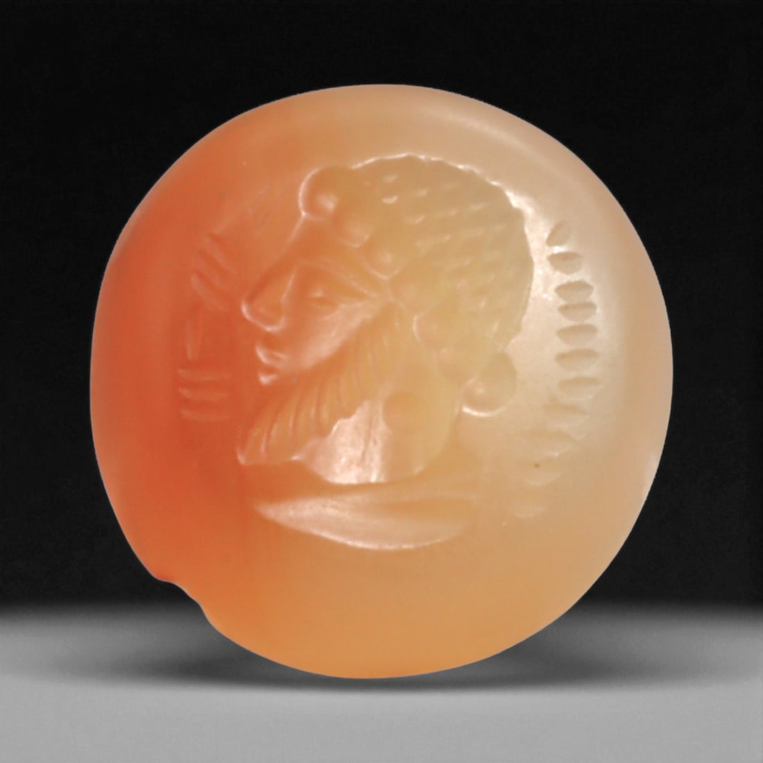 Ancient Sasanian Carnelian Intaglio with Engraving Motif, 1.5cm, 2g: This carnelian intaglio, finely engraved into the warm red tones of semi-precious stone, reflects a tradition of craftsmanship spanning from the classical world to the early modern era. Intaglios serv
