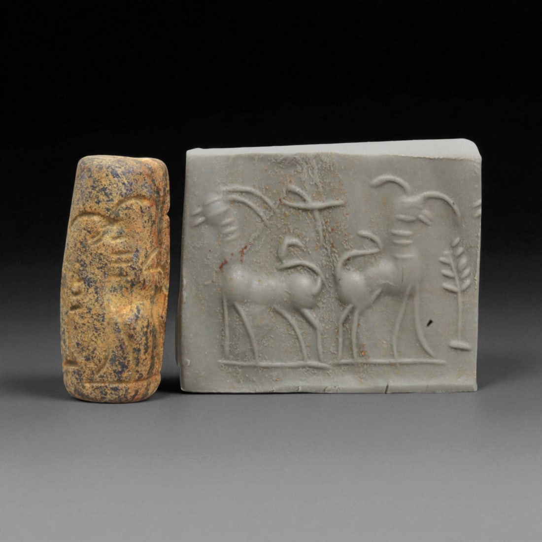 Ancient Akkadian Lapis Lazuli Cylinder Seal, c. 2334-2154 BCE, 2.5cm: This exceptional cylinder seal, carved from prized lapis lazuli, dates to the Akkadian Empire of Mesopotamia (c. 2334-2154 BCE). The seal is engraved with finely executed imagery, which when rolled on