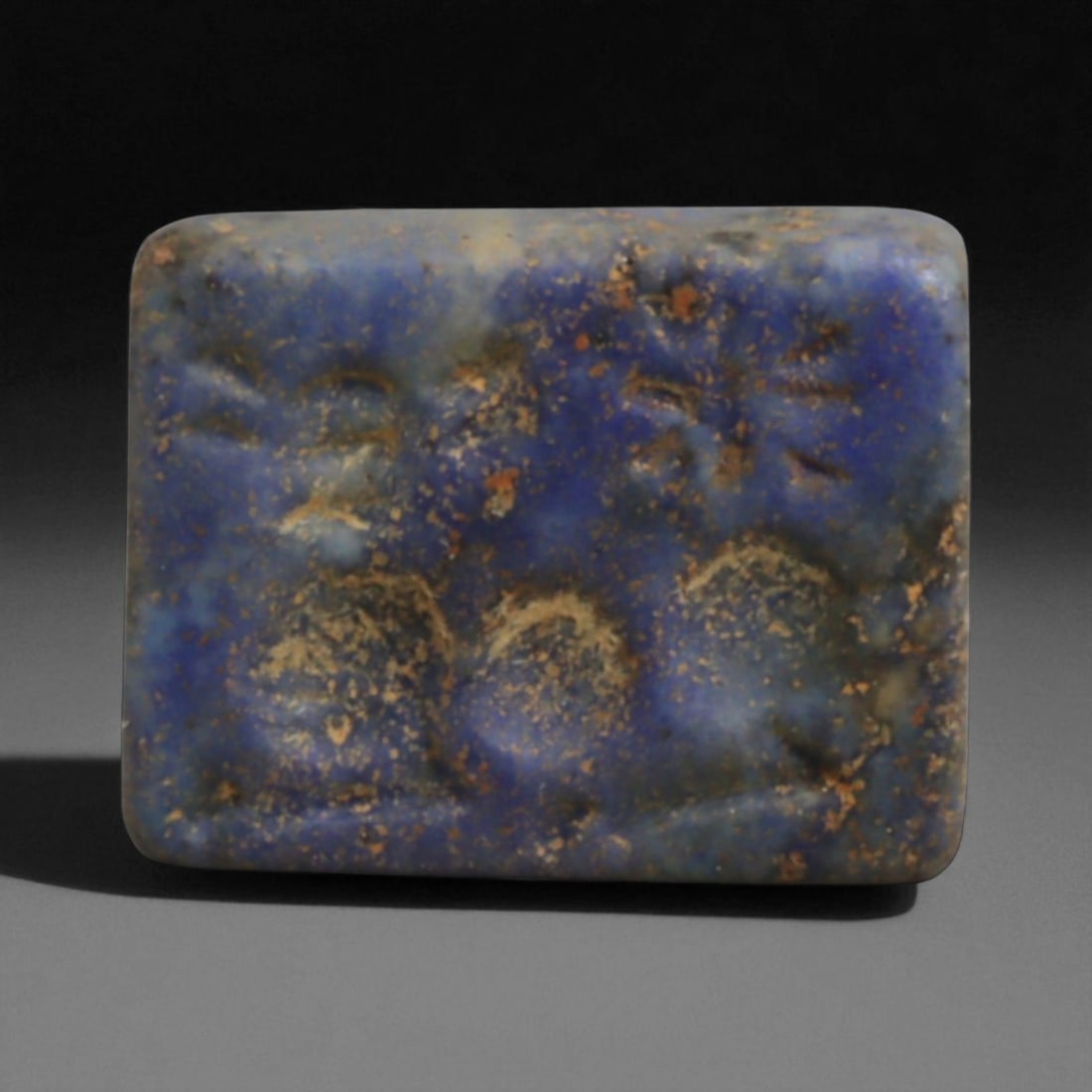 Ancient Elamite Lapis Lazuli Bifacial Stamp Seal, c. 2nd Millennium BCE, 1.5cm: This rare bifacial lapis lazuli stamp seal originates from Elam, the powerful kingdom centered in southwestern Iran that flourished alongside Mesopotamia during the 2nd millennium BCE. The Elamites we