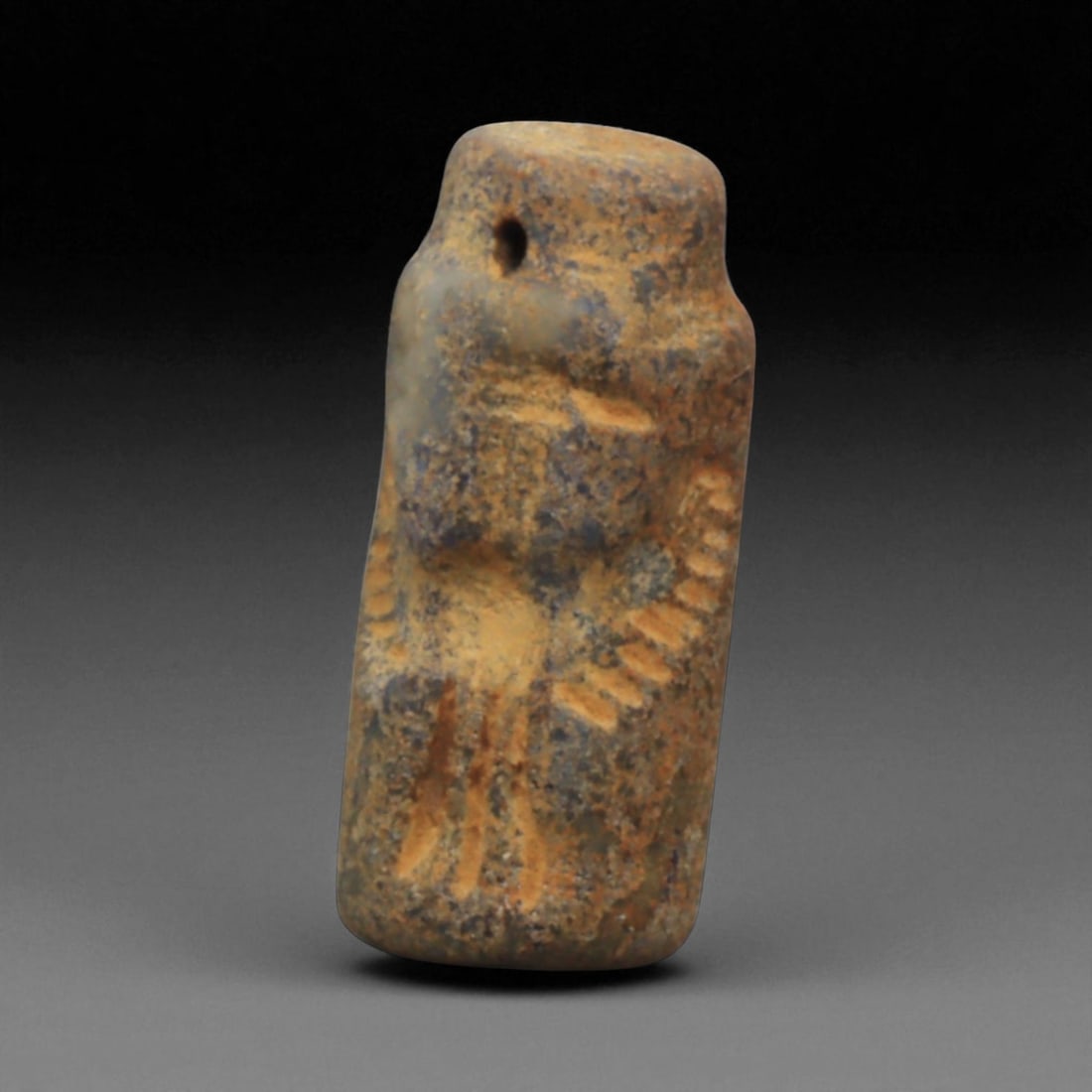 Ancient Akkadian Lapis Lazuli Cylinder Seal, c. 2334-2154 BCE, 2.2cm: This exceptional cylinder seal, carved from prized lapis lazuli, dates to the Akkadian Empire of Mesopotamia (c. 2334-2154 BCE). The seal is engraved with finely executed imagery, which when rolled on
