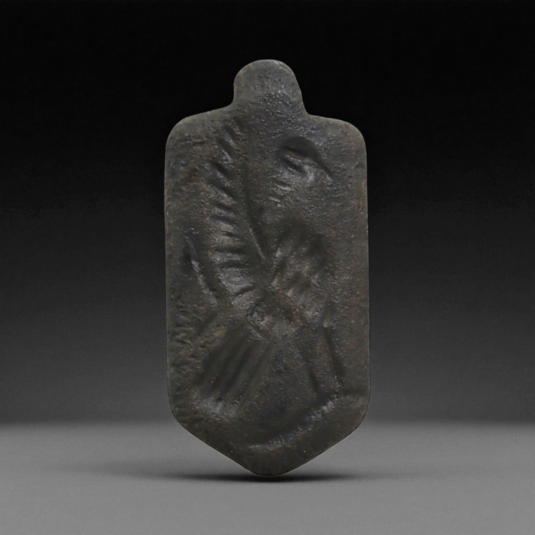 Ancient Near Eastern Relief Amulet Pendant Talisman, c. 2nd-5th Century CE, 4.3cm: This finely crafted ancient amulet pendant, designed for wear as a personal talisman. The engraved surface bears a carefully incised design, clearly visible when pressed into clay, illustrating its du