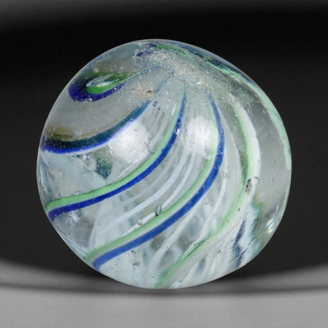 Vintage German Handmade Glass Swirl Marble, c. Early-Mid 20th Century, 14 mm: This vintage German handmade glass marble represents the golden era of European glass artistry, where precision craftsmanship and vibrant color blending elevated even simple play objects into collecti