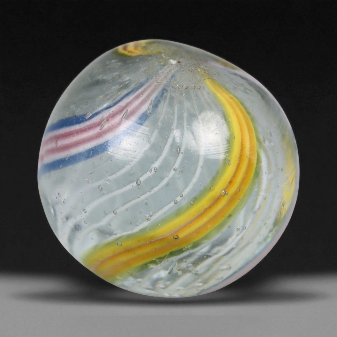 Vintage German Handmade Glass Swirl Marble, c. Early-Mid 20th Century, 16 mm: This vintage German handmade glass marble represents the golden era of European glass artistry, where precision craftsmanship and vibrant color blending elevated even simple play objects into collecti