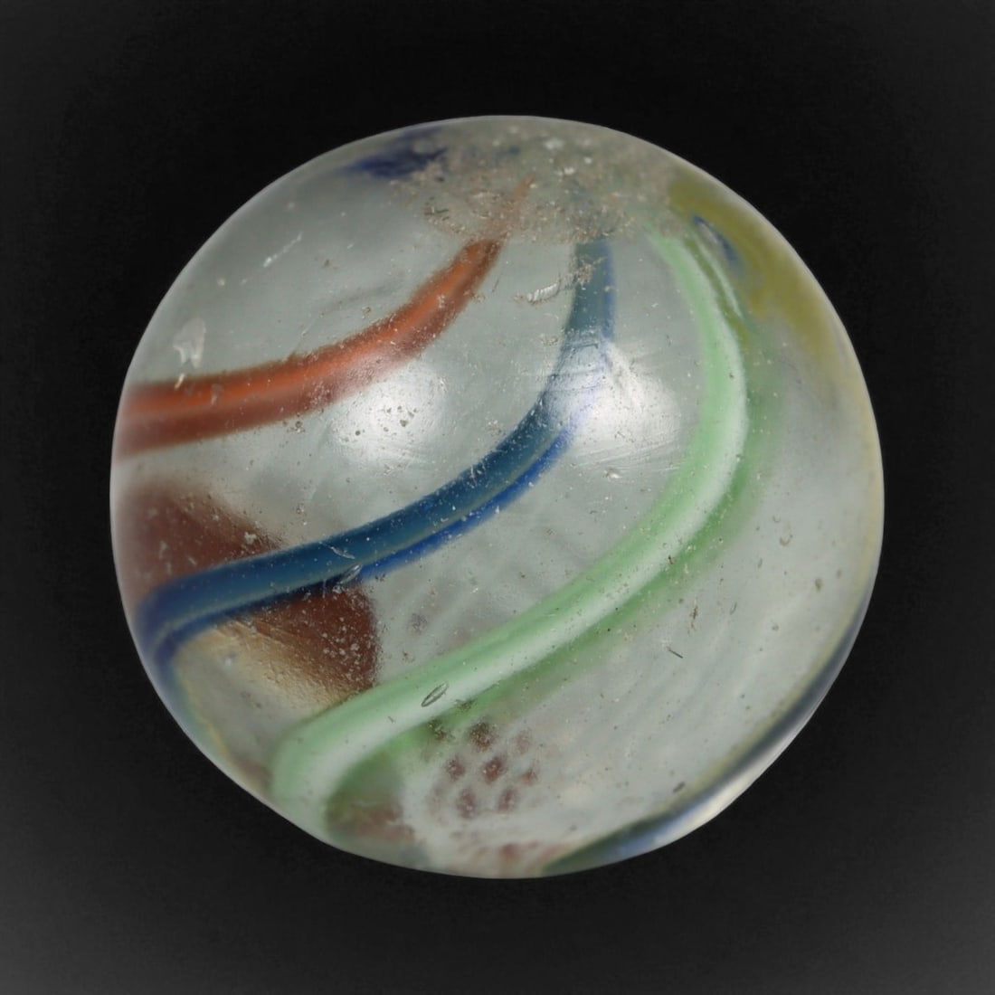 Vintage German Handmade Glass Swirl Marble, c. Early-Mid 20th Century, 15 mm: This vintage German handmade glass marble represents the golden era of European glass artistry, where precision craftsmanship and vibrant color blending elevated even simple play objects into collecti