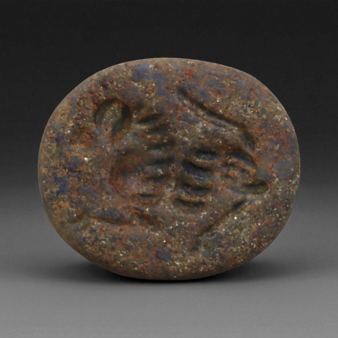 Ancient Akkadian Lapis Lazuli Stamp Seal with Reclining Ibex, c. 2300-2100 BCE, 1.7cm: This exquisite miniature stamp seal, carved from deep blue lapis lazuli, dates to the Akkadian Empire-one of the most artistically refined and spiritually charged civilizations of ancient Mesopotamia.
