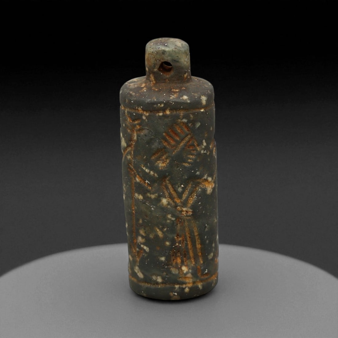 Ancient Mesopotamian Administrative Cylinder Seal, c. 2nd-1st Millennium BCE, 4.7cm: This authentic cylinder seal from ancient Mesopotamia dates to the 2nd to 1st millennium BCE, a time when the art of carving miniature narratives on stone reached remarkable levels of refinement. Seal