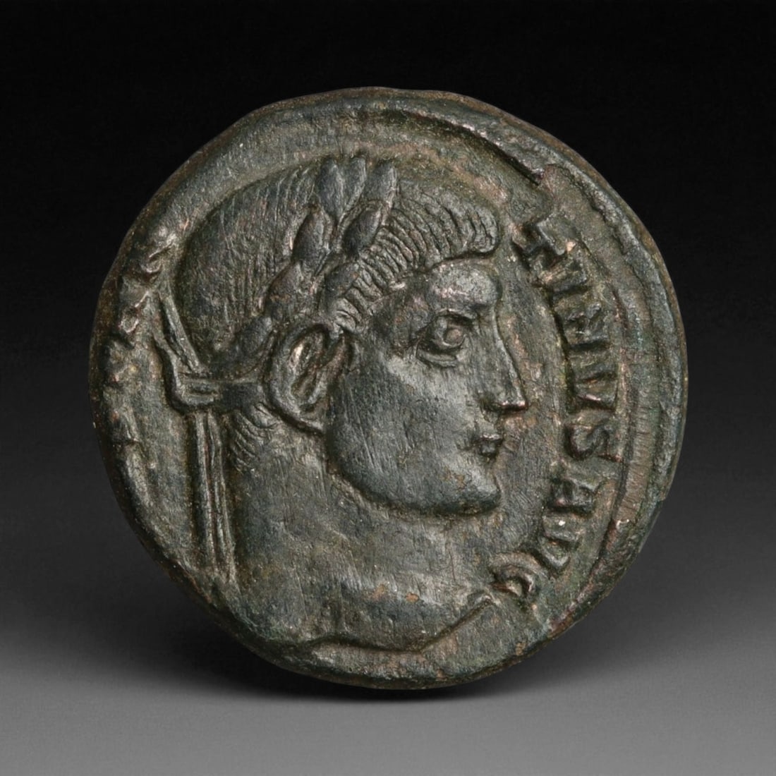 ROMAN EMPIRE: Imperial Authority - Bronze Coin, c. 1st-3rd Century AD, 18mm: Struck during the turbulent decades of the later Roman Empire, this 19mm bronze coin reflects the enduring symbolism of imperial control amidst crisis. Its compact yet deliberate design likely feature