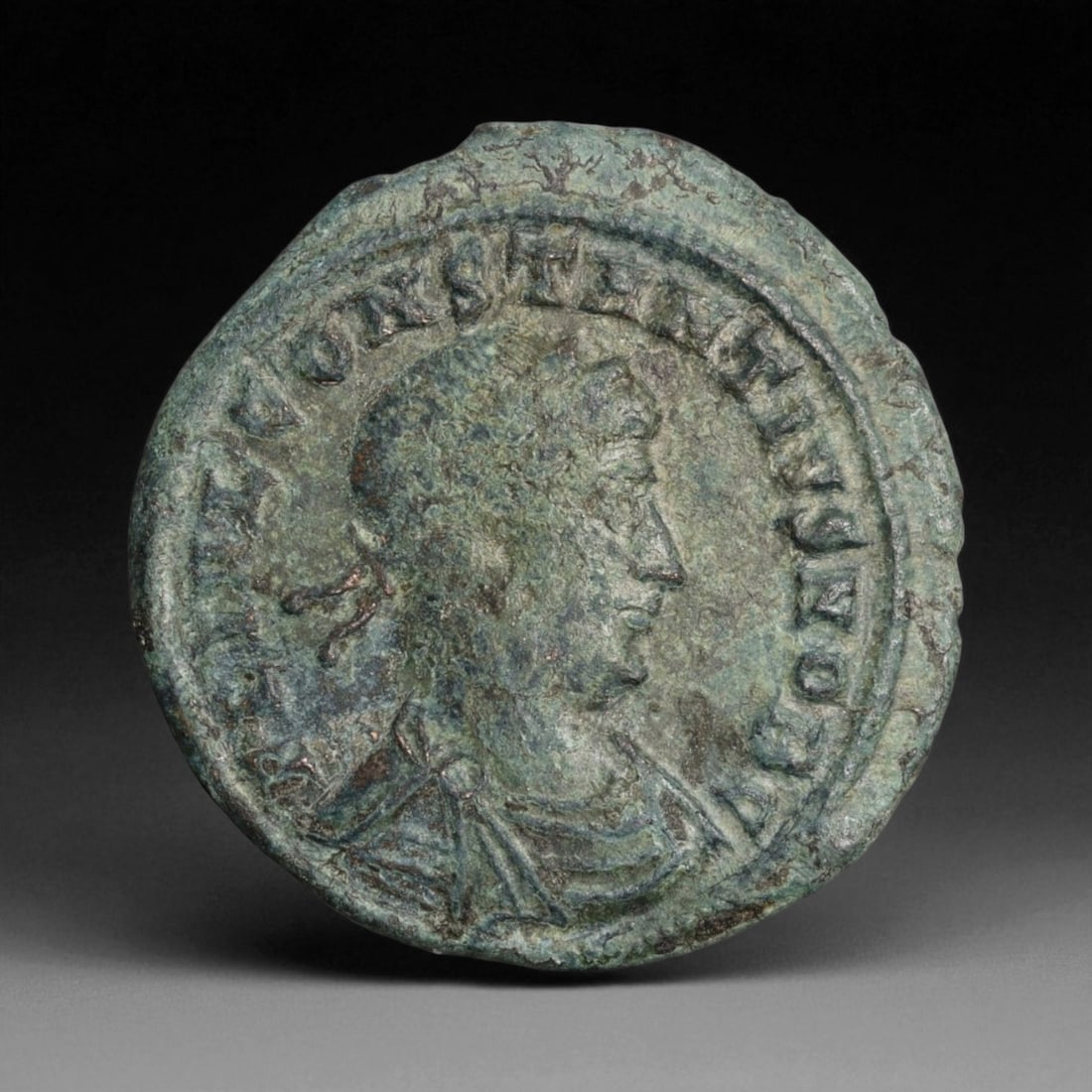 ROMAN EMPIRE: Imperial Authority - Bronze Coin, c. 1st-3rd Century AD, 19mm: Struck during the turbulent decades of the later Roman Empire, this 19mm bronze coin reflects the enduring symbolism of imperial control amidst crisis. Its compact yet deliberate design likely feature