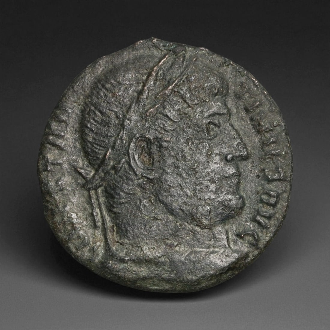 ROMAN EMPIRE: Imperial Authority - Bronze Coin, c. 1st-3rd Century AD, 18mm: Struck during the turbulent decades of the later Roman Empire, this 19mm bronze coin reflects the enduring symbolism of imperial control amidst crisis. Its compact yet deliberate design likely feature