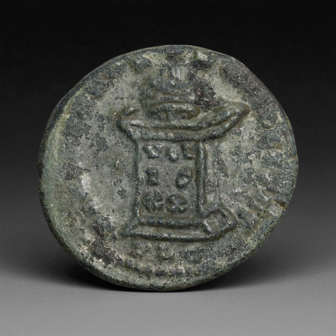 ROMAN EMPIRE: Imperial Authority - Bronze Coin, c. 1st-3rd Century AD, 19mm: Struck during the turbulent decades of the later Roman Empire, this 19mm bronze coin reflects the enduring symbolism of imperial control amidst crisis. Its compact yet deliberate design likely feature