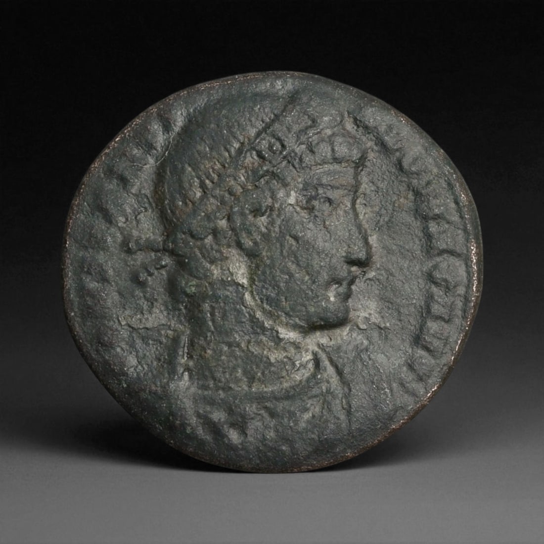 ROMAN EMPIRE: Imperial Authority - Bronze Coin, c. 1st-3rd Century AD, 17mm: Struck during the turbulent decades of the later Roman Empire, this 19mm bronze coin reflects the enduring symbolism of imperial control amidst crisis. Its compact yet deliberate design likely feature