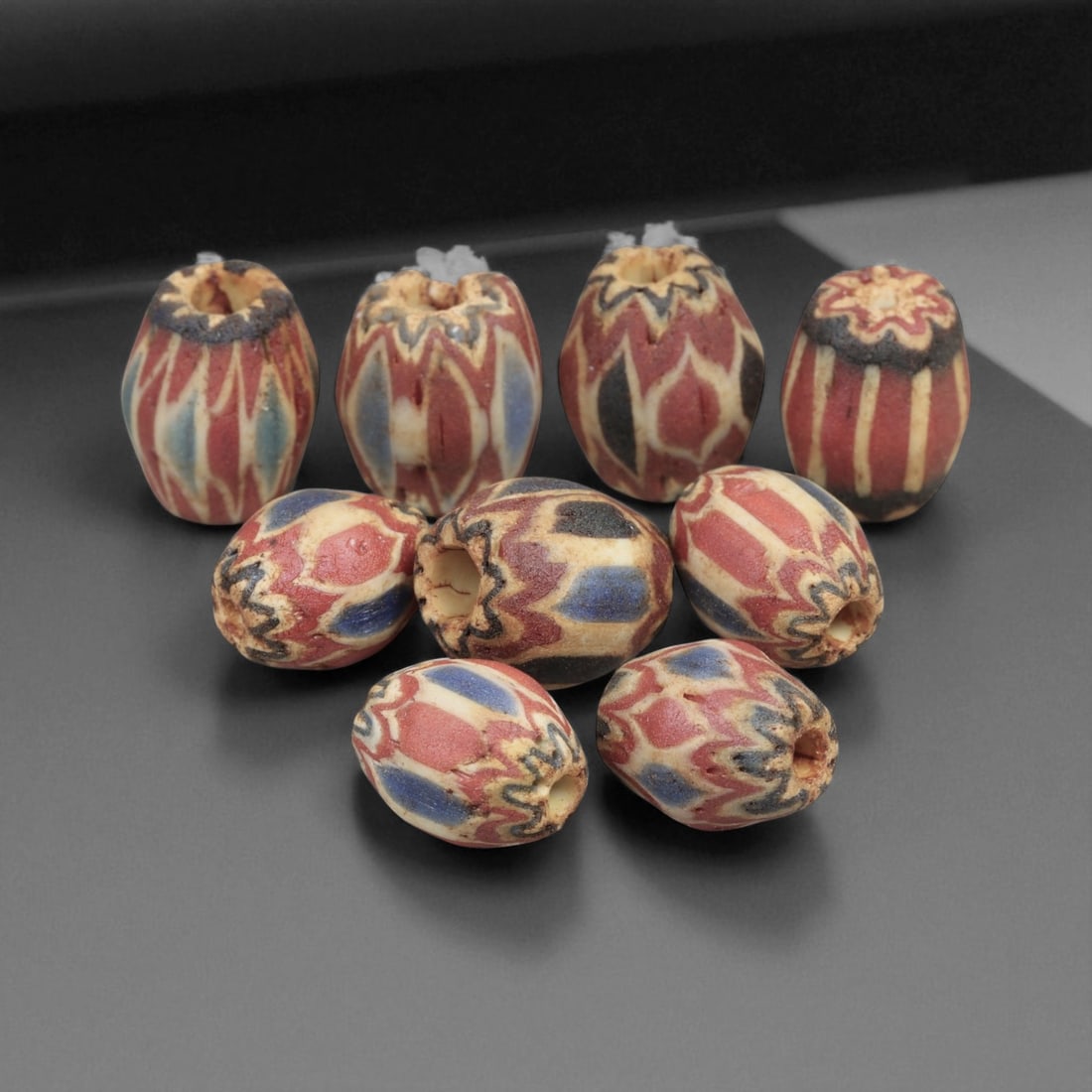 Antique Venetian Chevron Trade Glass Beads, c. 18th-19th Century, 1.2-1.3cm: This fine lot of Venetian chevron beads represents the height of Murano glass artistry during the 18th and 19th centuries. Known for their layered starburst patterns, chevron beads were among the most