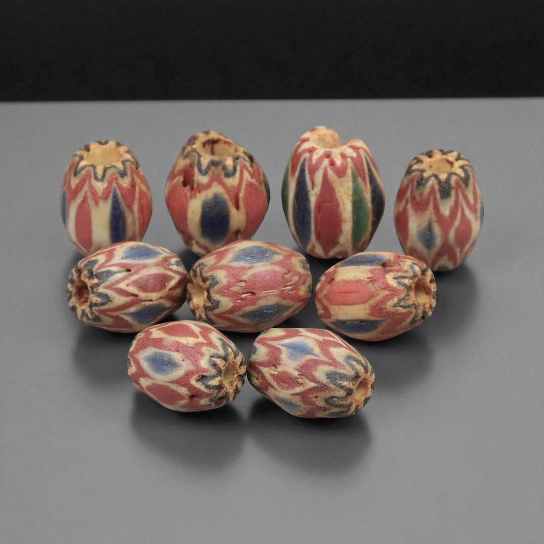 Antique Venetian Chevron Trade Glass Beads, c. 18th-19th Century, 1.1-1.3cm: This fine lot of Venetian chevron beads represents the height of Murano glass artistry during the 18th and 19th centuries. Known for their layered starburst patterns, chevron beads were among the most