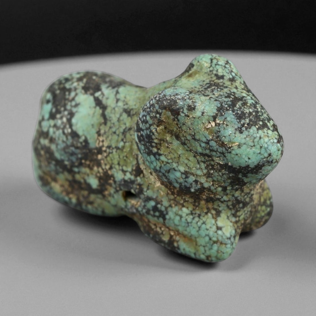 Ancient Persian Turquoise Ram Amulet, c. 6th-4th Century BCE, 2.5cm: This exquisite ancient turquoise ram amulet, dating to the Achaemenid Persian period (c. 6th-4th century BCE), captures the refinement and spiritual depth of one of antiquity's most artistically accom