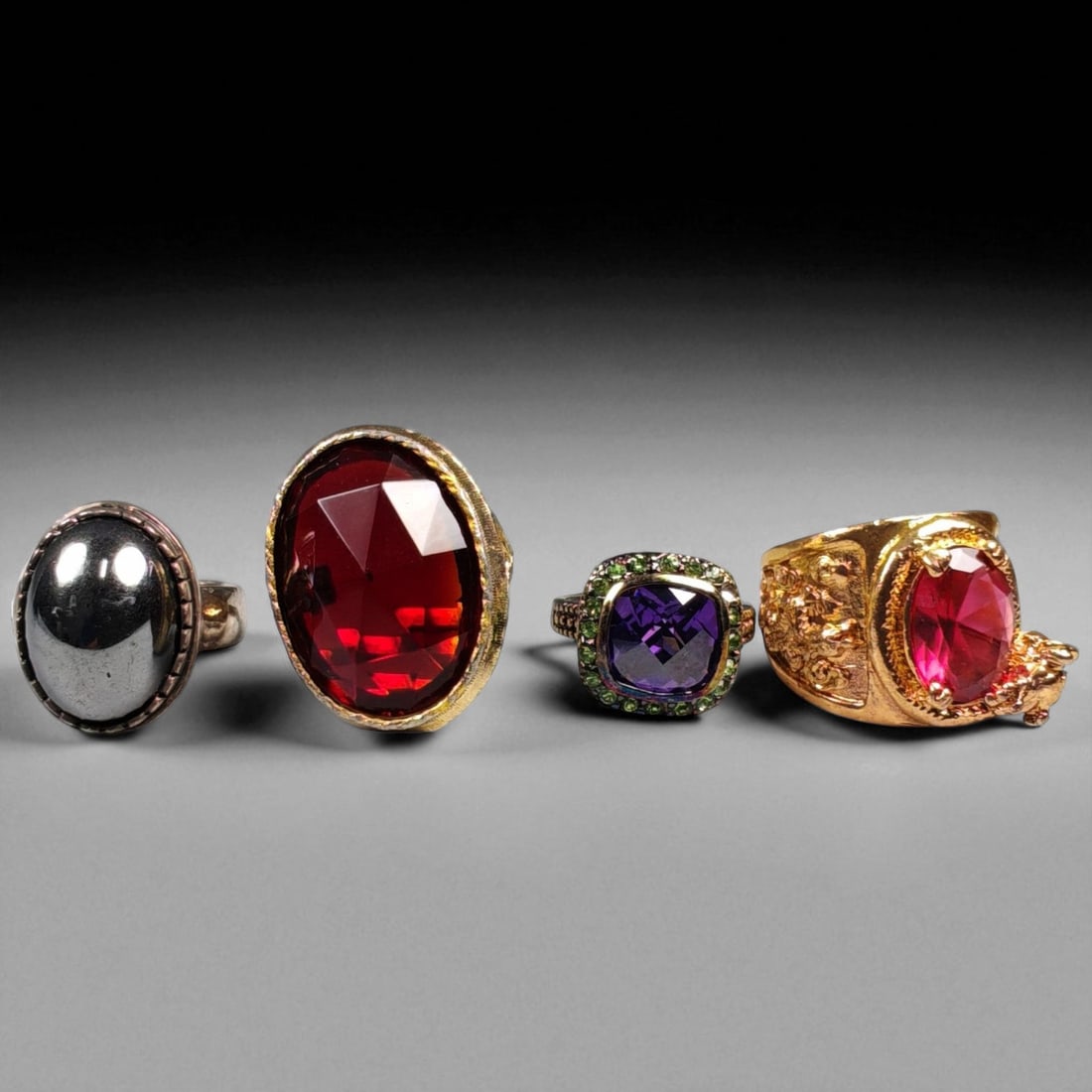 Lot of 4 Vintage and Contemporary Fashion Ring Lot, c. 20th-21st Century: This assorted lot of vintage and contemporary fashion rings offers a vibrant collection of statement pieces showcasing diverse styles, materials, and craftsmanship. Designed for decorative wear rather