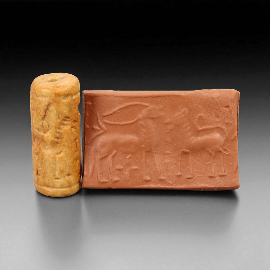 Ancient Mesopotamian Stone Cylinder Seal with Ritual Motifs, c. 2nd-1st Millennium BCE, 4.3cm: A striking relic from the dawn of civilization, this ancient Mesopotamian cylinder seal dates to the 2nd-1st millennium BCE - a period when art, writing, and ritual became inseparable expressions of c