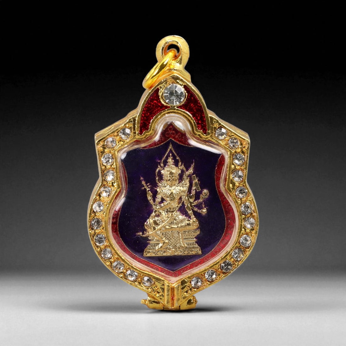Thai Temple Style Gilt Buddhist Amulet in Ornate Gold-Tone Frame, 5.8cm: This beautifully crafted gilt Buddhist amulet is enclosed within an intricately designed gold-tone frame, combining sacred symbolism with refined artistry. The detailed relief and lustrous finish refl
